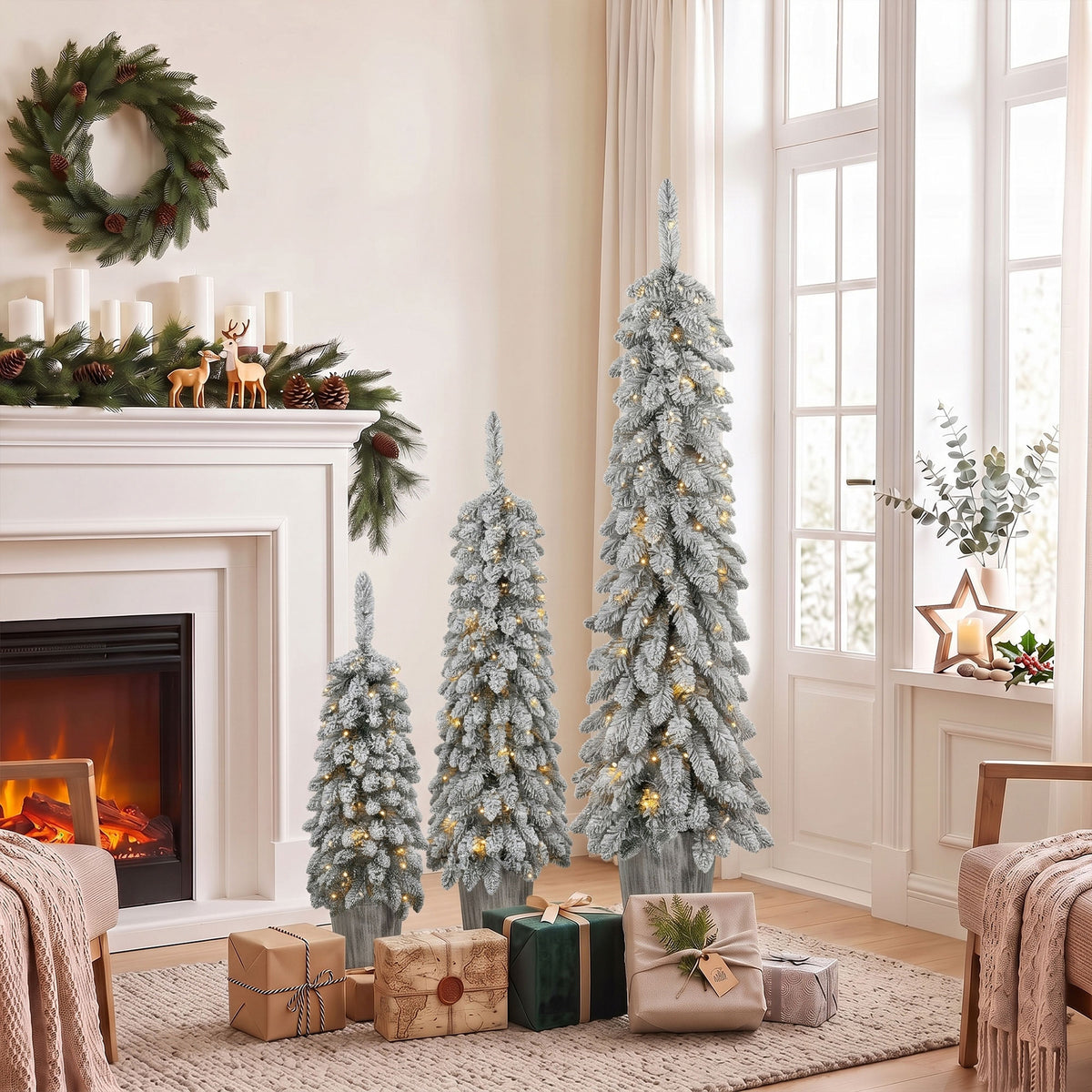 Set of 3 flocked artificial Christmas trees, pre-lit with PVC branch tips and warm white LED lights (2)